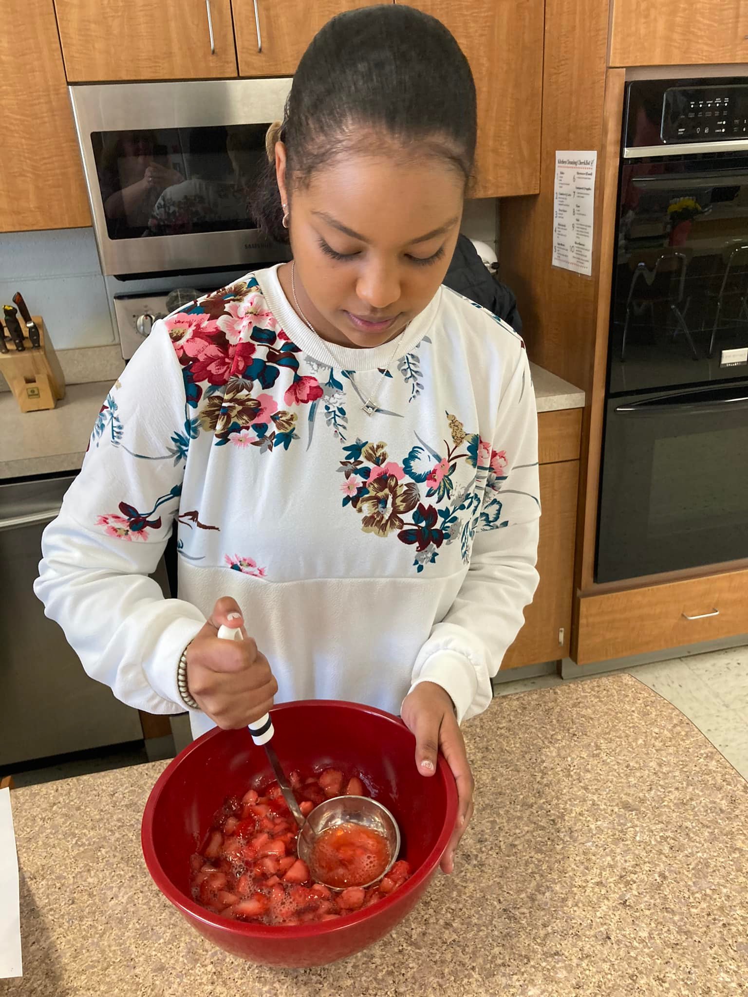 HHS student learning proper canning techniques