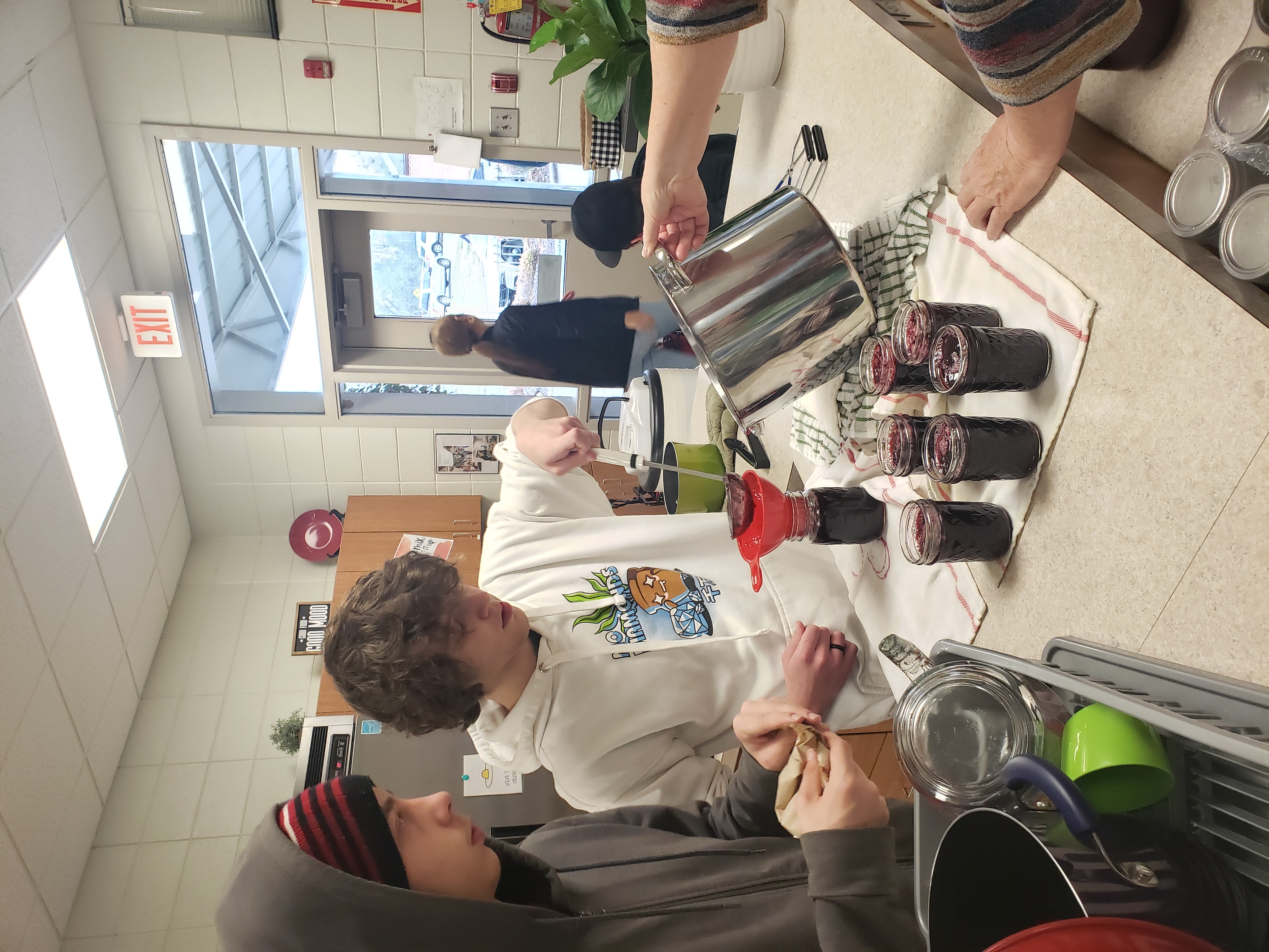 HHS Students learning proper canning techniques