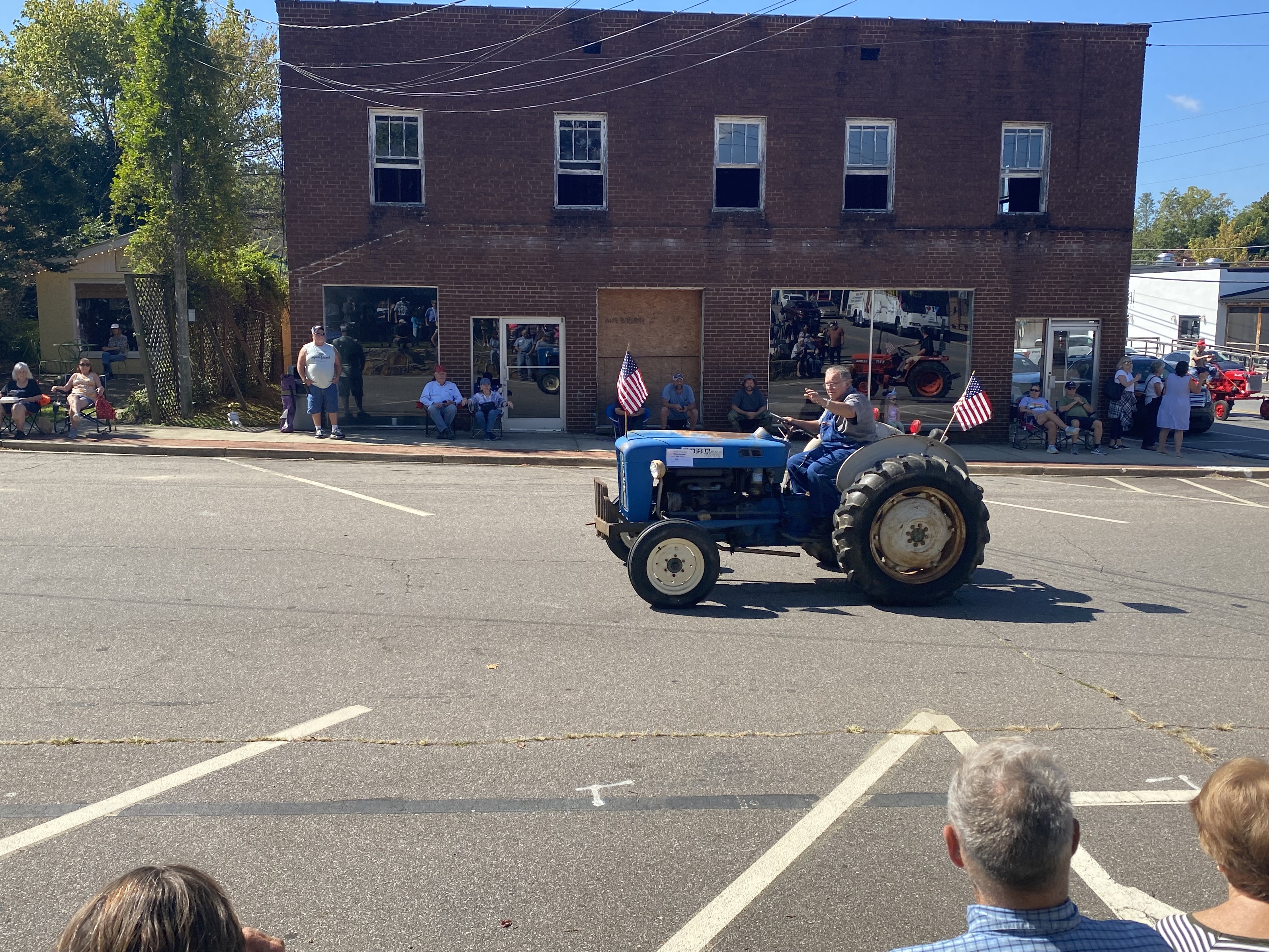 blue tractor in parade
