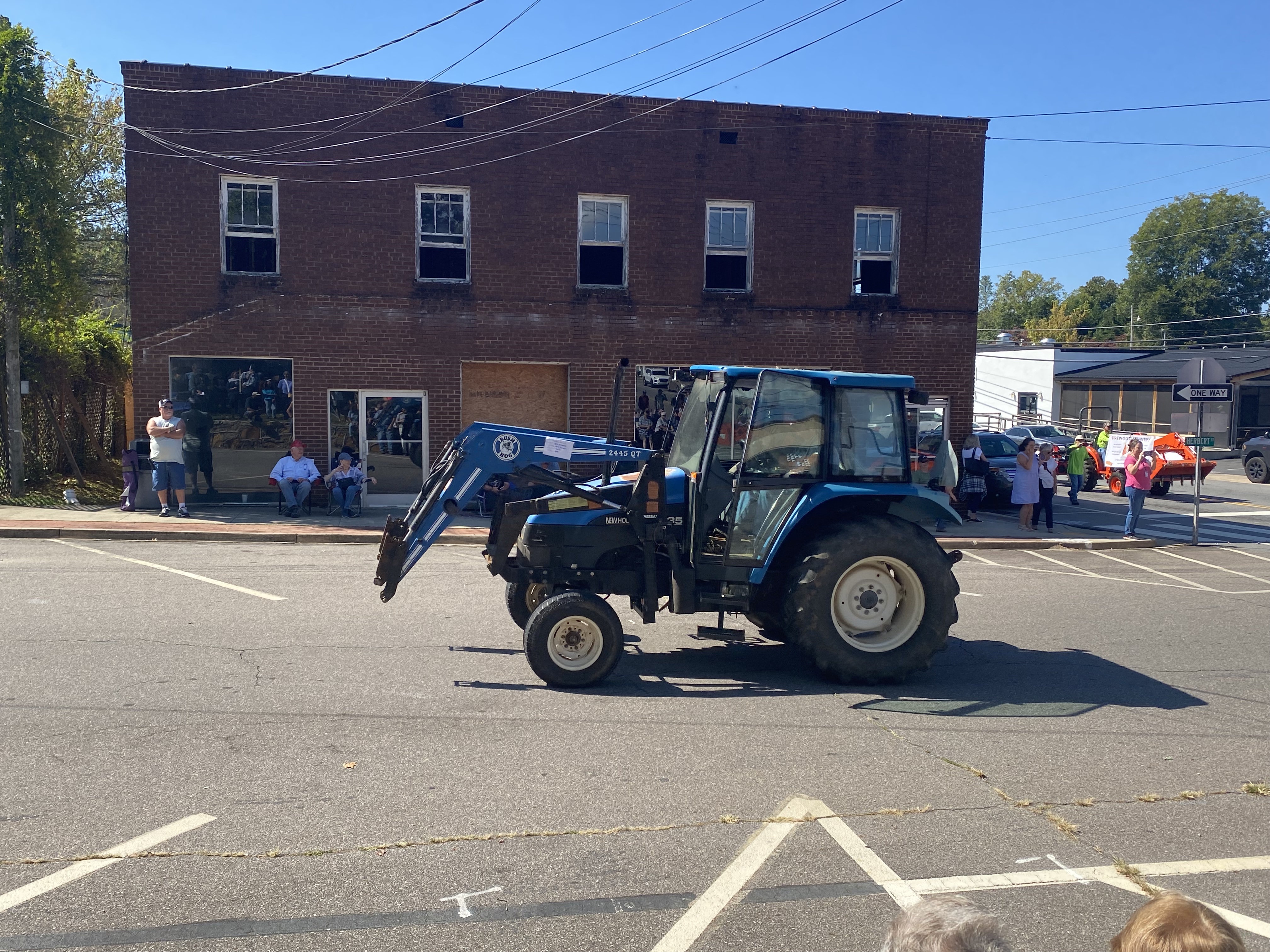 blue tractor in parade