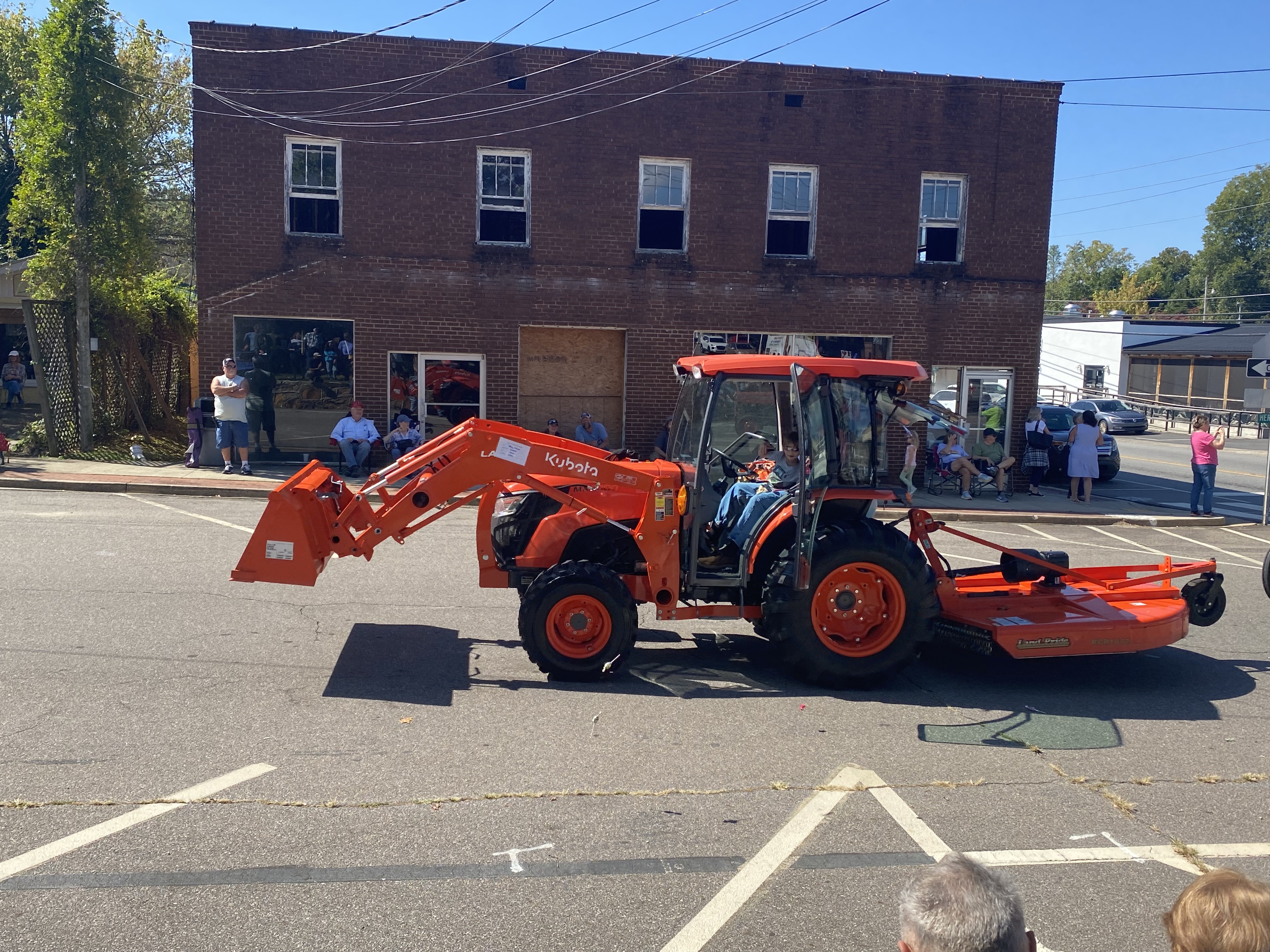orange tractor in parade