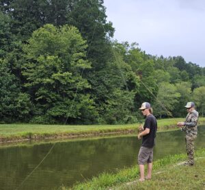 Zeke Rogers and Greg Charles fishing